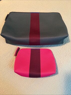 Rothy’s striped cosmetic pouches - dark green, plum & hot pink
